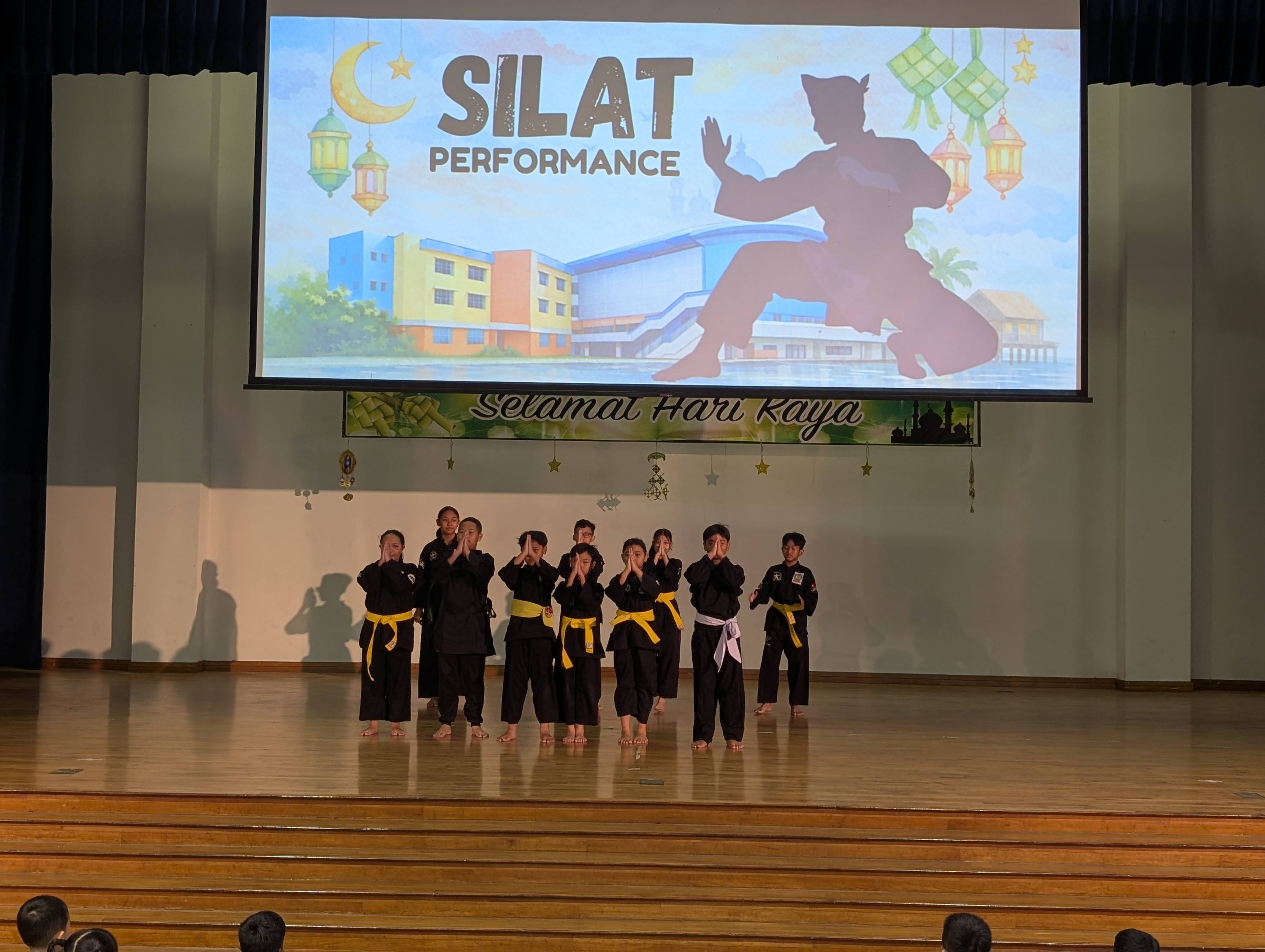 Our silat performers on stage, showcasing a traditional art form rich in heritage and discipline.